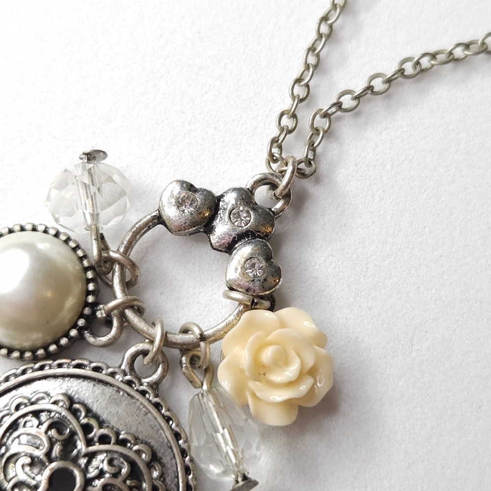 Steve Madden Silver Plated Heart & Flower Charm Necklace - Picture 3 of 7